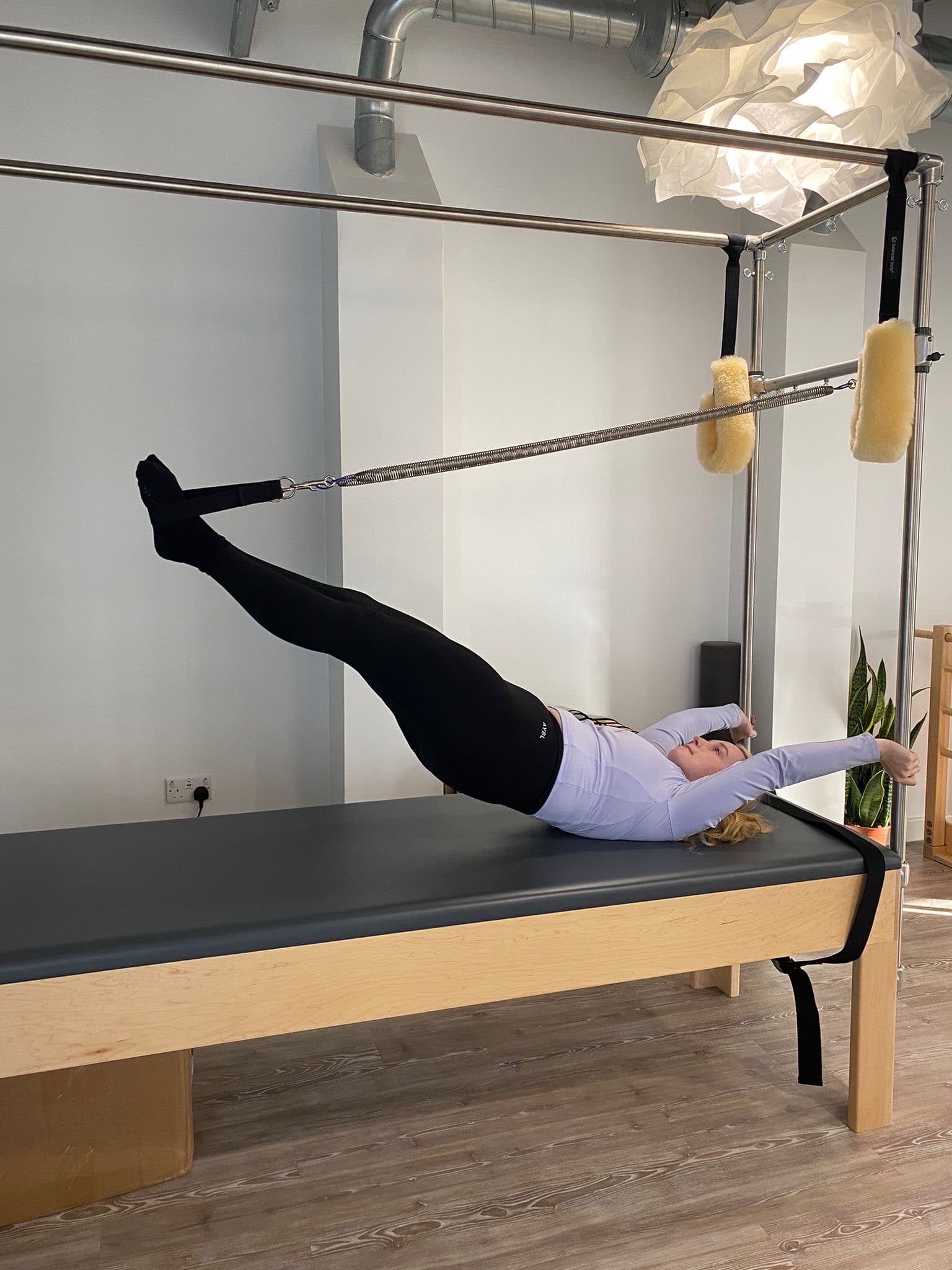 Sophie doing Reformer Pilates